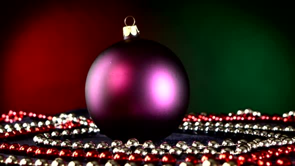 Matte Purple Toy for Christmas or New Year and Beads, Rotation, on Red and Green alt