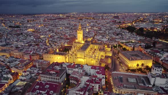 Flying Around the Famous Gothic Cathedral in Seville at Night Andalusia Spain alt