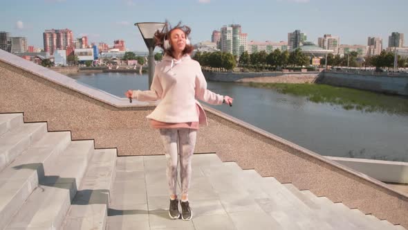 Sequence Of Young Woman Jogging Outdoors alt