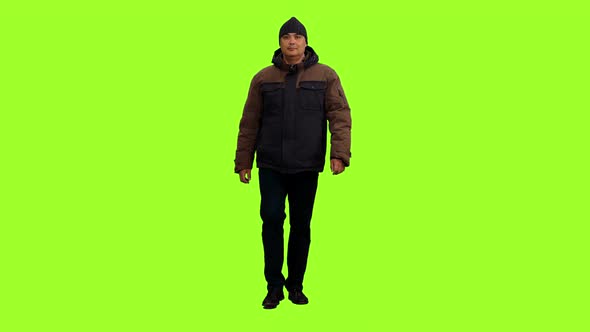Walking Middle Aged Man in Winter Clothes  