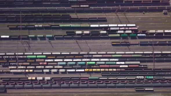 Aerial View of Railway Sorting Station and A Lot of Wagons at a Railway alt