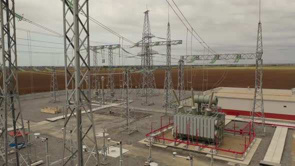 Construction Site of a Power Station Structures and Power Lines alt