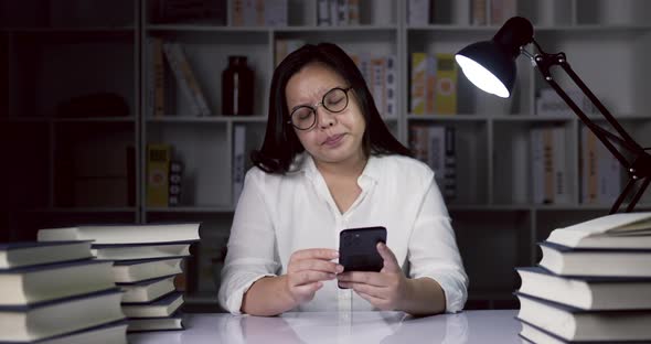 young woman working from home overload at night alt