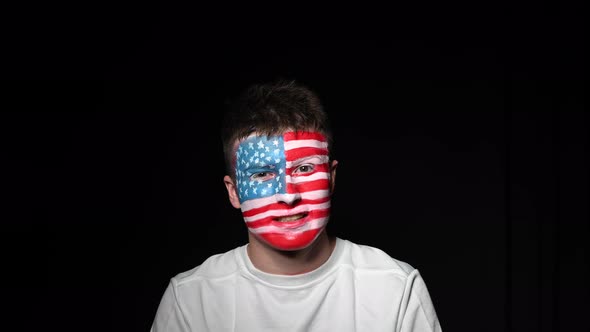 Happy Fan Rejoices Victory of His Favorite Team of USA alt