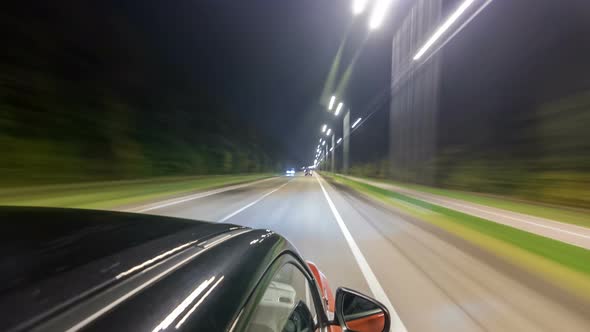 Drivelapse From Top Side of Car Moving on a Night Highway Timelapse Hyperlapse alt