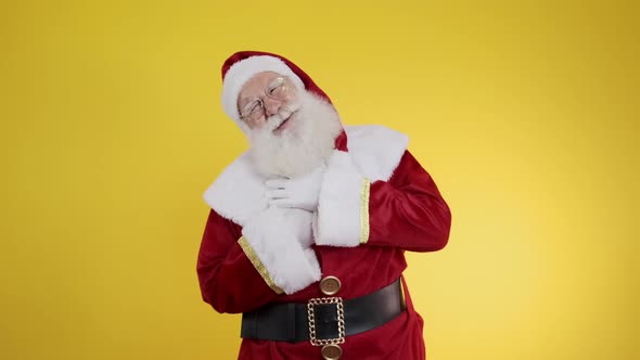 Santa Claus infarcting on yellow background. Santa having a sudden heart attack and feeling bad