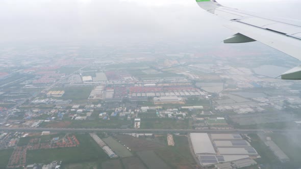 Airplane Approaching Before Landing During the Rain
