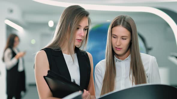 Businesswoman at Virtual Reality Development Center or Exhibition alt