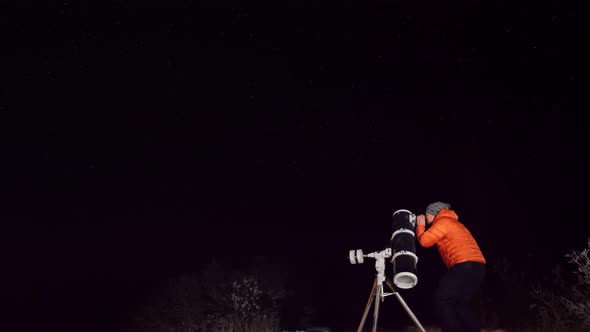 Experienced Amateur Astronomer Adjusts His Professional Large Newtonian Reflecting Telescope alt