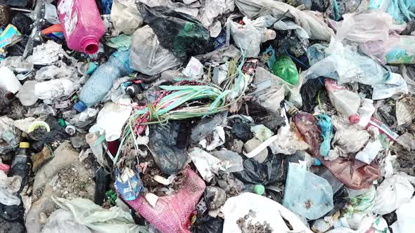 Marine garbage, landfill, garbage brought by the ocean, garbage platform. alt