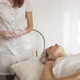 A Masseur Gives a Woman a Professional Facial Massage - VideoHive Item for Sale