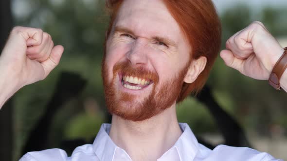 Designer Celebrating Success  Gesture in Office alt