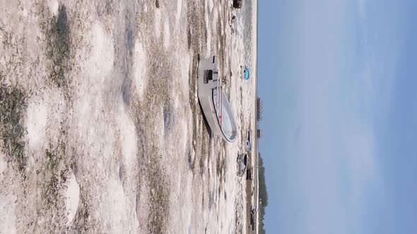 Vertical Video of Low Tide in the Ocean Near the Coast of Zanzibar Tanzania Aerial View alt