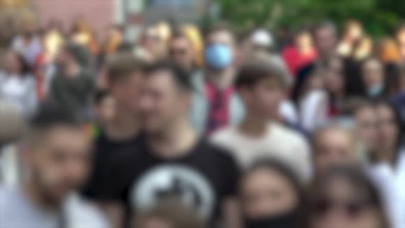 Silhouettes of People Walking in a Crowd Slow Motion alt