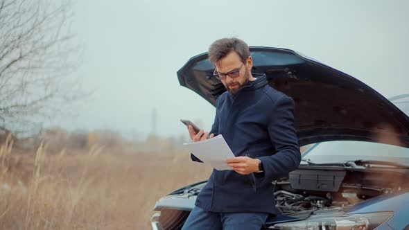 Auto Insurance.Car Insurance Calling Support Service. Car Accident Auto.Man Fixing Engine On Car. alt