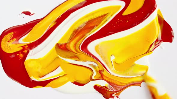 Artist Mixing Ingredients Red and Yellow Watercolor Using Palette Knife and Pigments on White alt
