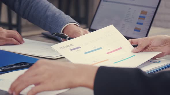 Asian businessman shaking hands partnership deal business in the office. alt