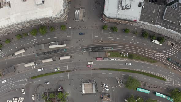 AERIAL: Overhead Top Down View of Frankfurt Am Main, Germany Public Transport on Street with People alt