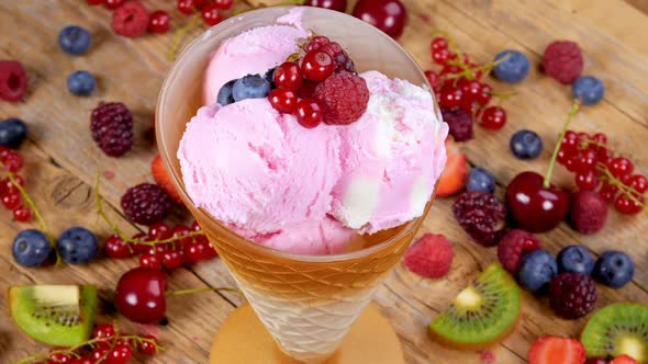 Fruit Ice Cream in Cup Rotating on Table