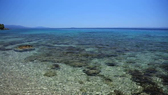Greece rock beach in summertime season