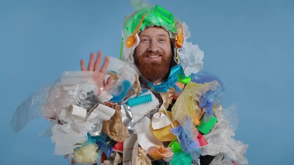  Man wearing junk suit and showing hi gesture