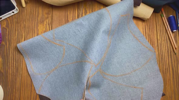 Top View of Women's Hands Cut Out Details for Neck Corset with Scissors alt