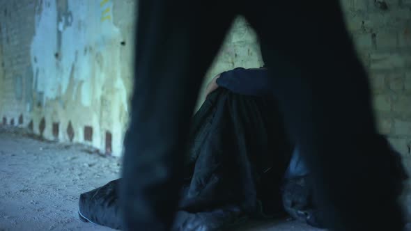 Upset Homeless Teenager Wearing Hoodie, People Passing by Indifferently, Poverty alt