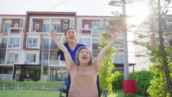Asian happy Senior patient grandmother have fun outdoor at green park. alt