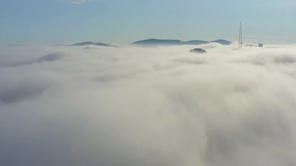 Drone View of the Vladivostok Lowlands Covered in Morning Sea Mist at Dawn alt