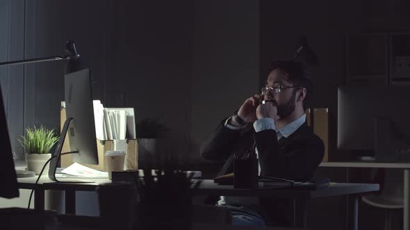 Man Working Late in the Office alt