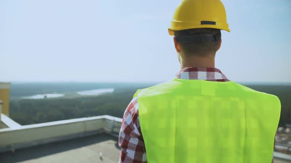 Construction Supervisor Checking Building Standing Roof, Professional Foreman