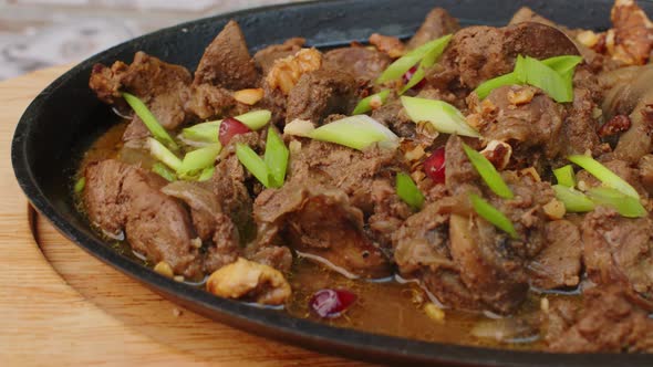 Beef Stew in Frying Pan on Table Close Up View