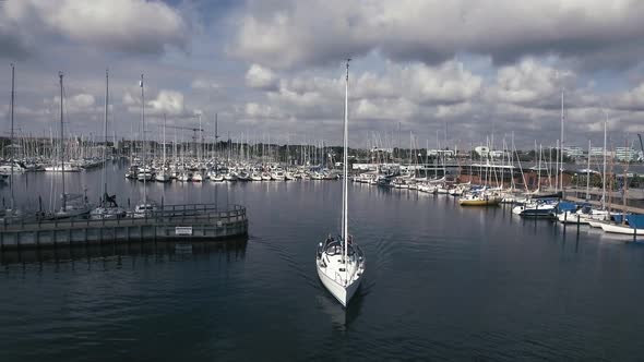 Sailboat On Way Out Of The Port, Drone Flying Over Boat