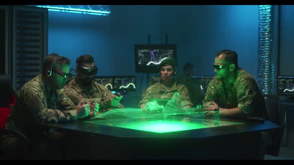 Soldiers Remote Controlling Unmanned Ground Vehicle alt