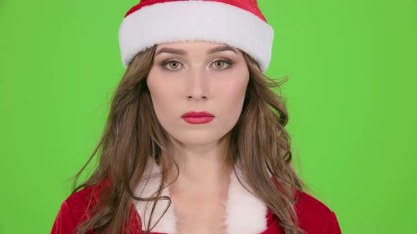 Santas Assistant Starts Smiles. Green Screen. Close Up. Slow Motion alt