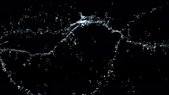 Super Slow Motion Shot of Twisting Water Splash at 1000Fps Isolated on Black Background alt