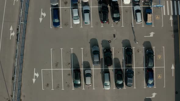 Top Aerial Drone View Car Driving and Parked Free Parking Space. View From Above Flying Drone Cars alt