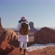 Young Happy Woman Enjoying Cinematic Nature Western Landscape in Monument Valley - VideoHive Item for Sale