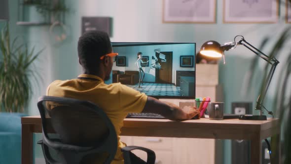 Black 3D Designer Creating Tutorial on Computer alt