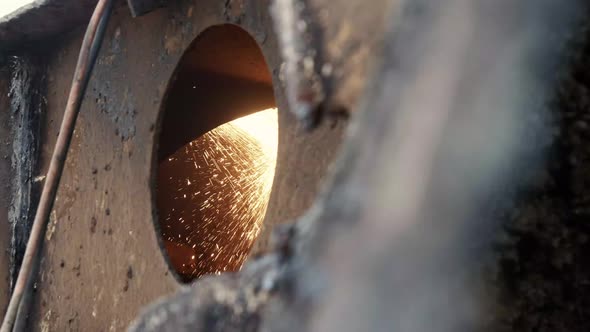 View Of Yellow Sparks Flying Inside Hull At Breakers Yard alt
