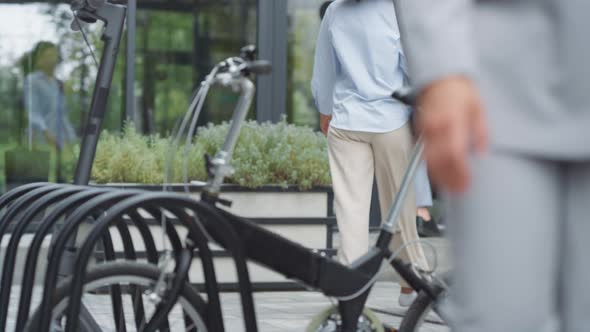 Businesswoman Entering Office Building Rear View alt