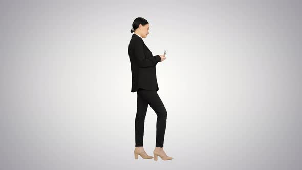 Brunette Woman Counting Euro Banknotes and Looking To Camera on Gradient Background alt