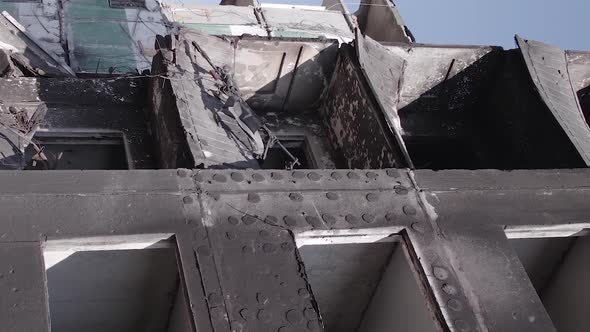 Vertical Video of a Multistorey Building Destroyed During the War in Ukraine alt