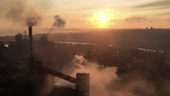Aerial View Over Industrialized City with Air Atmosphere. Dirty Smoke and Smog From Pipes of Steel alt
