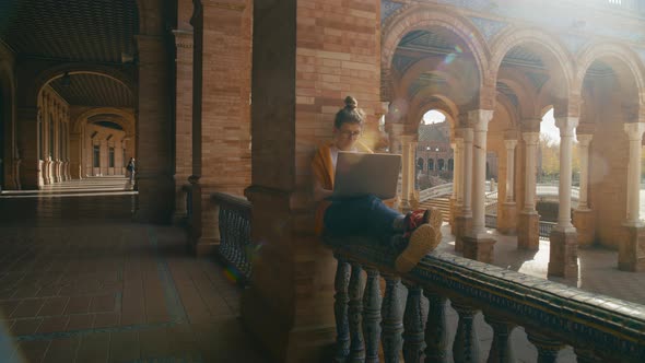 Young Student Work on Laptop at University Campus