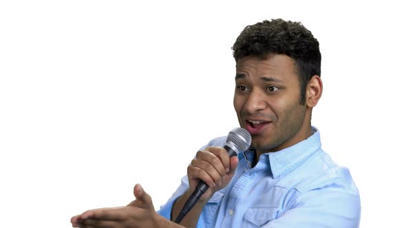 Energetic Entertainer Talking Into Microphone alt