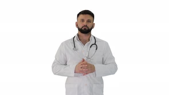 Doctor with a Beard Looking to Camera on White Background
