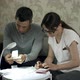 Young Couple Planning Their Family Budget - VideoHive Item for Sale