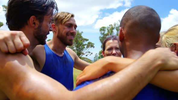 Fit people standing together and forming a hurdle 4k alt