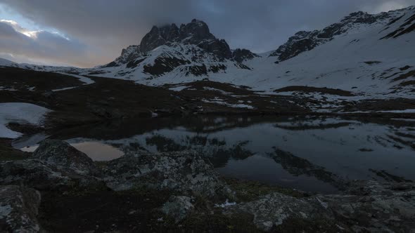 Timelapse of Sunset in Snowy Mountains